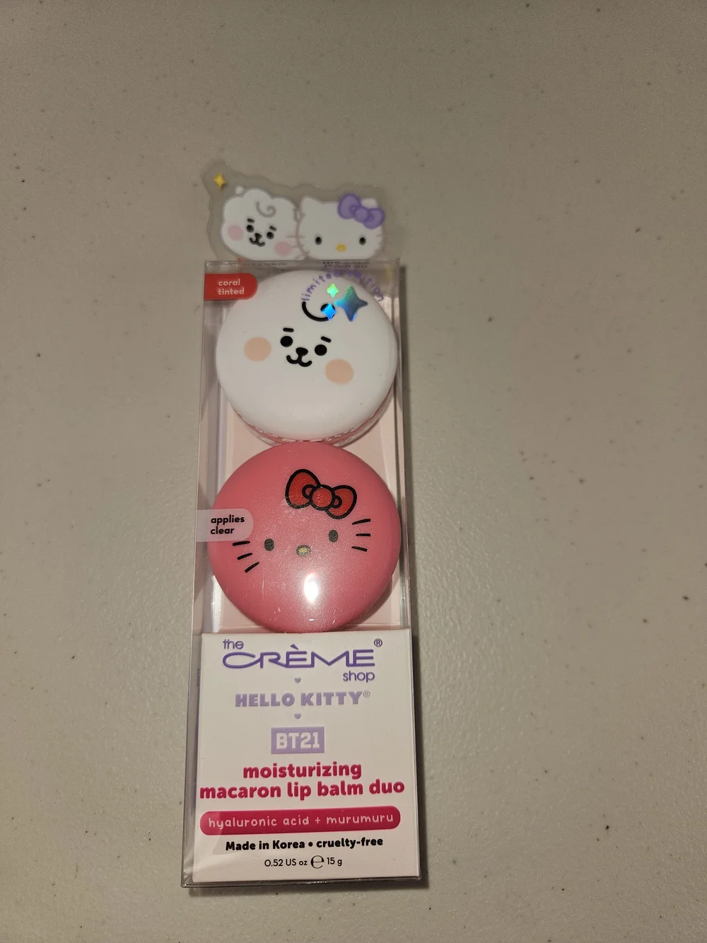 Hello Kitty Macaroon Lip balm Duo product mistaken for phone accessory